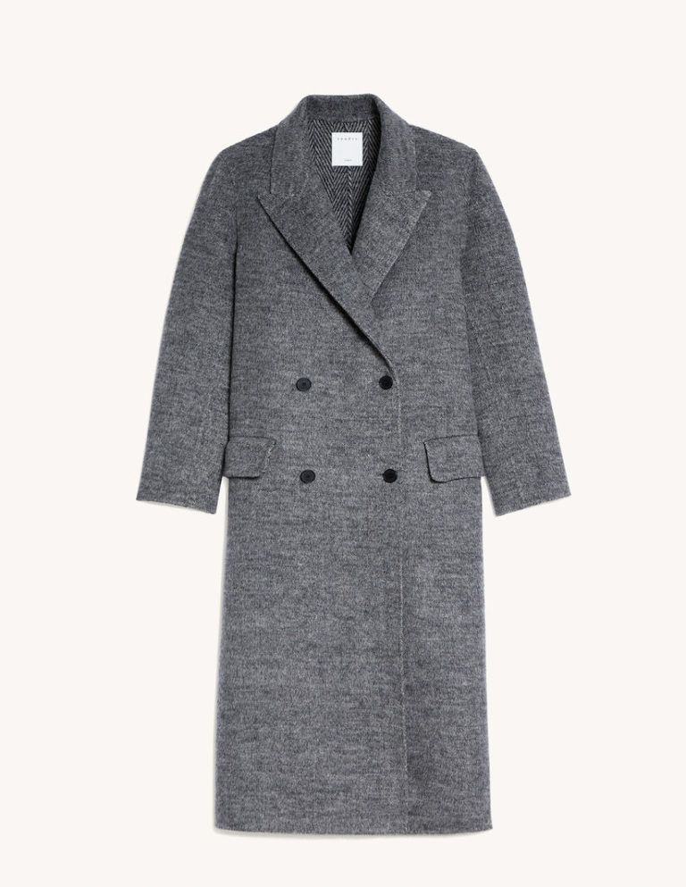 Devina Bhaga Best Personal Stylist NYC & Vancouver styling a women's winter coat