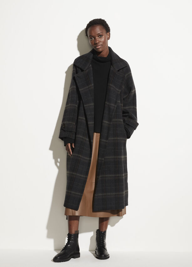 NYC & Vancouver Personal Stylist Devina Bhaga styling a winter coat for women